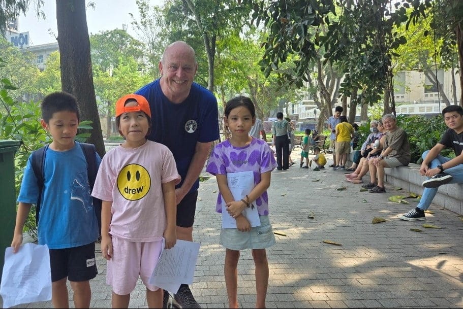 Young English students with me at Hoen Kiem Lake.