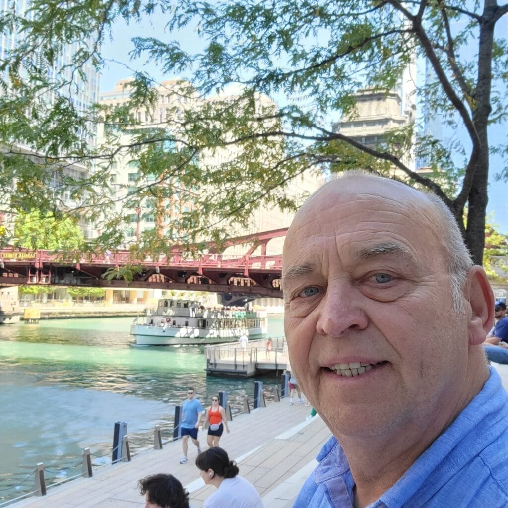 Sitting By The Chicago River Days Before Becoming A Full Timw Traveler